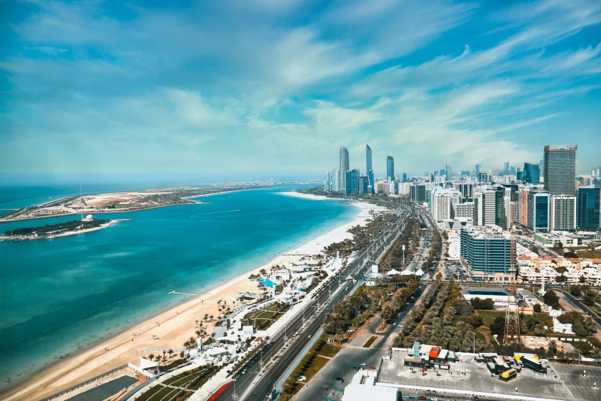 Scenic view of Abu Dhabi skyline at sunset