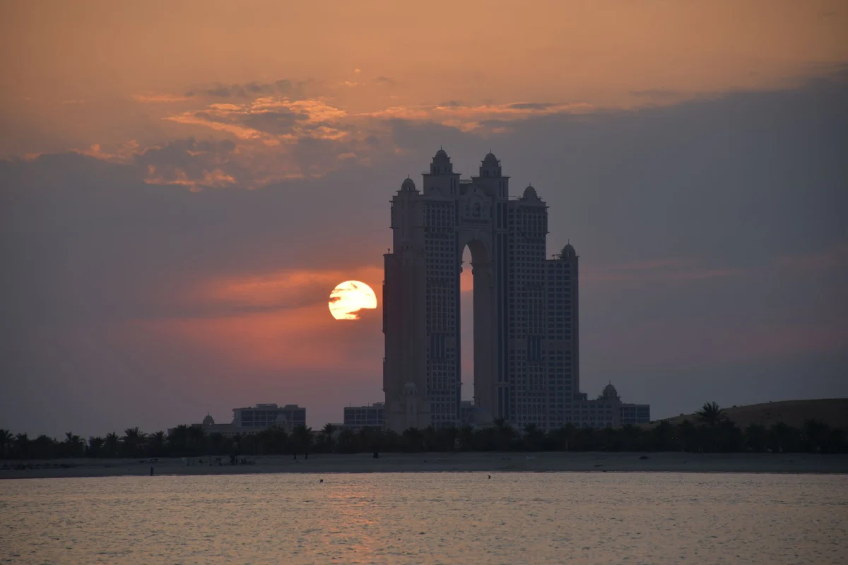 Stunning Abu Dhabi skyline at sunset with iconic landmarks