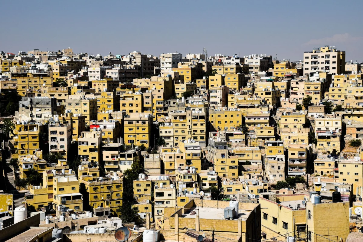 A panoramic view of Amman's skyline, featuring landmark architecture