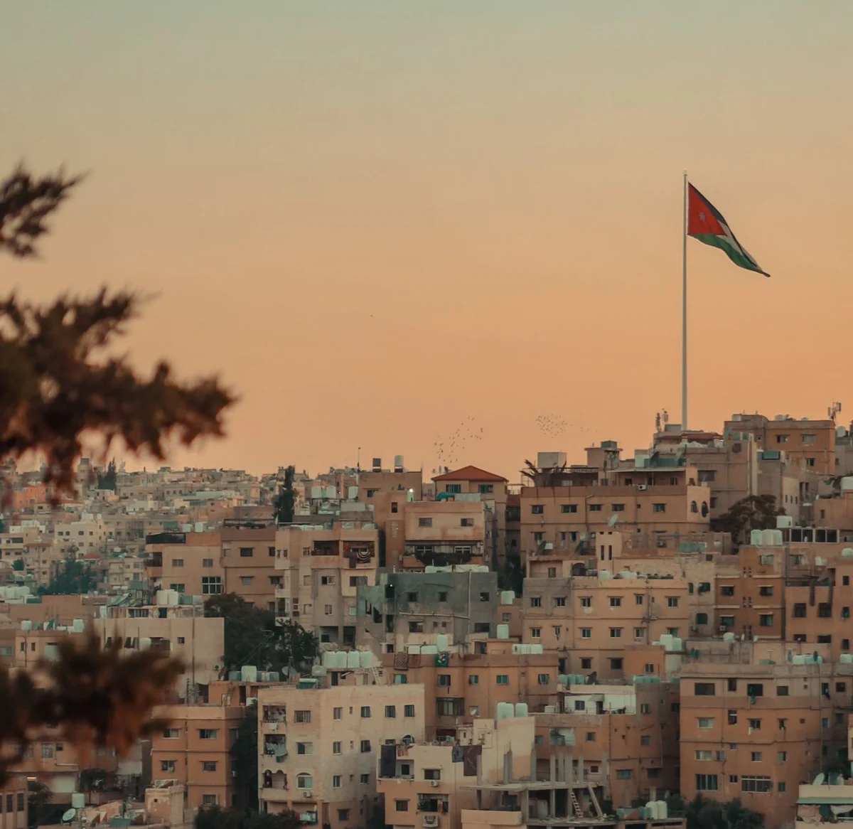 Romantic sunset view over the skyline of Amman