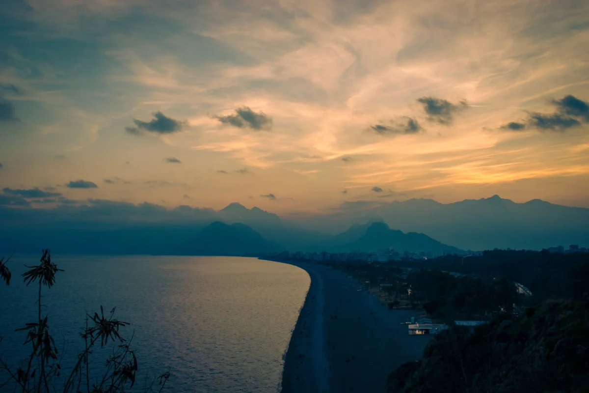 Scenic view of Antalya's coastline at sunset with romantic ambiance