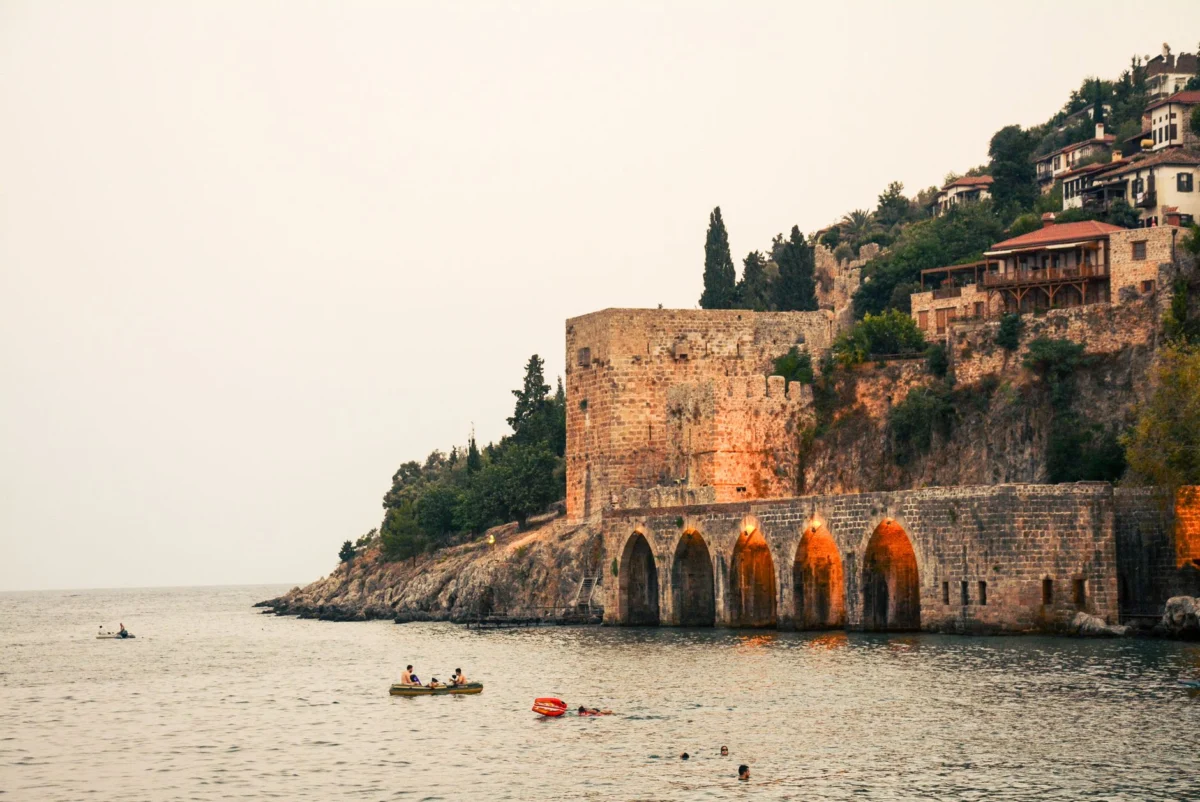 Antalya skyline at sunset featuring historic buildings