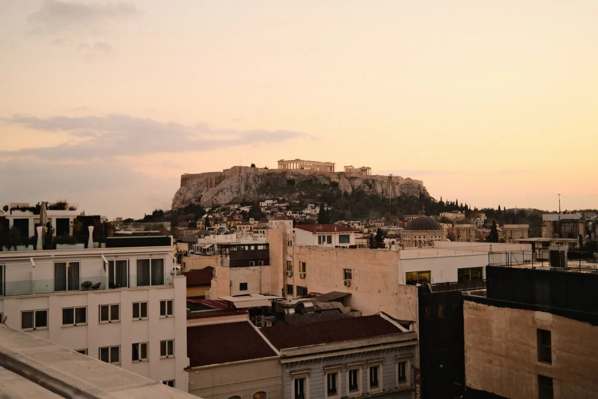 View of the Athens Acropolis at sunset, capturing historical allure