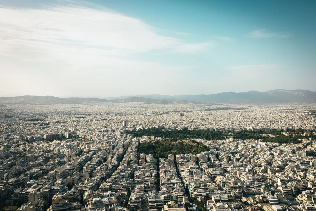 View of Athens city skyline at night with Acropolis