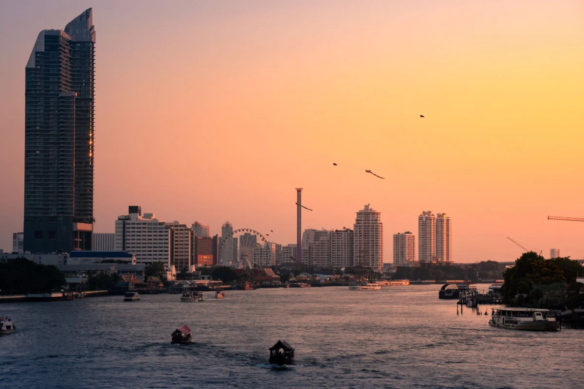 Stunning Bangkok skyline at sunset with river view