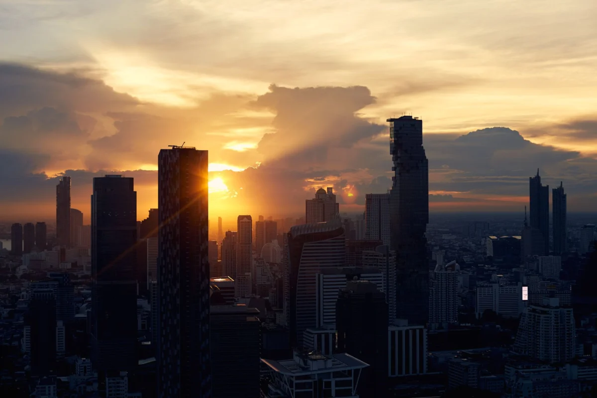 A stunning sunset over the Bangkok skyline, highlighting serenity