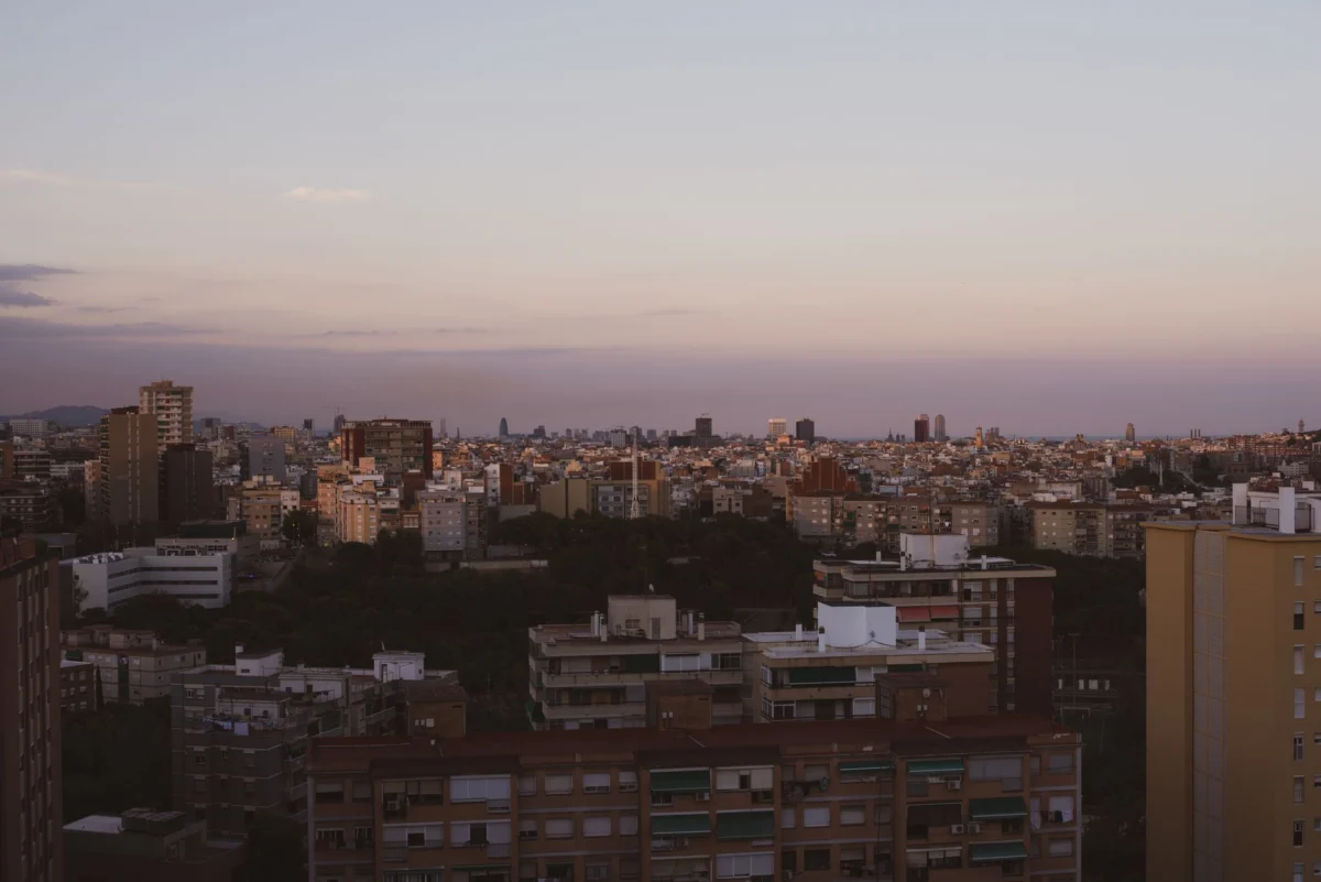 Romantic sunset over Barcelona, highlighting the city skyline