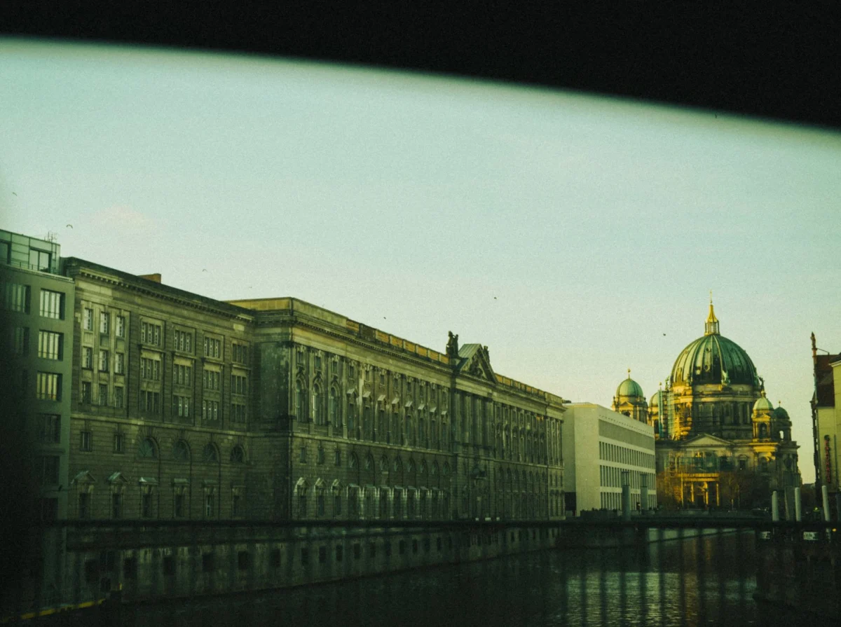 A romantic view of Berlin's skyline at sunset highlighting the city's cultural allure
