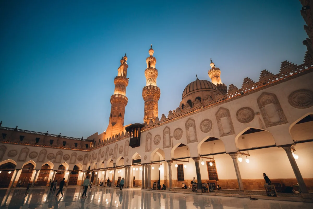 Cairo skyline illuminated at night with bustling streets