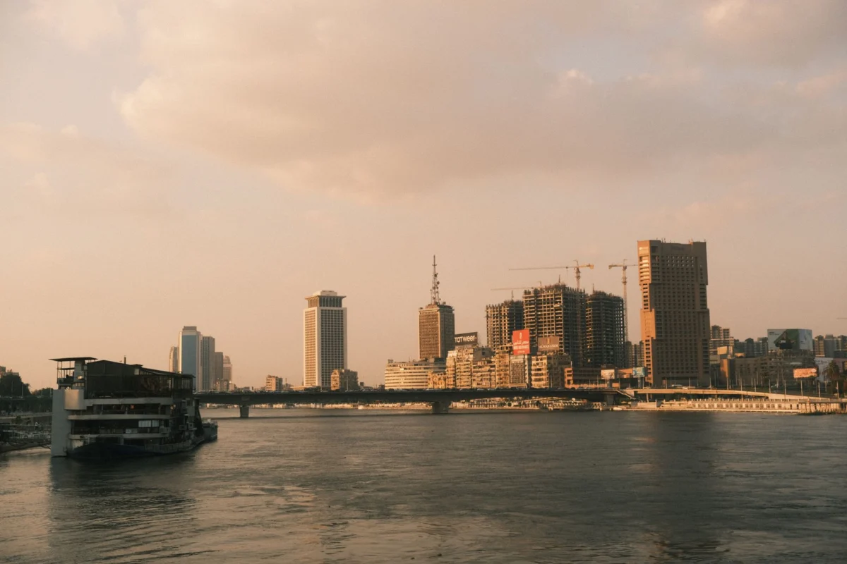 Romantic sunset over Cairo skyline with iconic landmarks