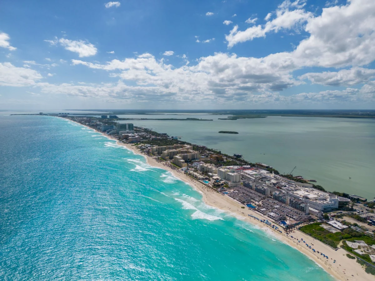 Romantic evening skyline of Cancun with couples walking