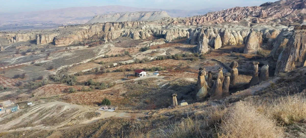 Breathtaking view of Cappadocia's iconic fairy chimneys and landscape