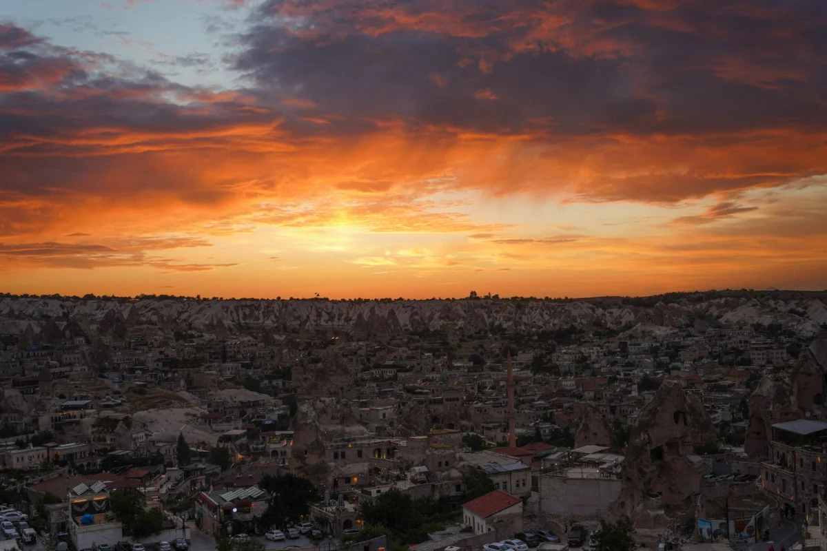 Panoramic view of Cappadocia at sunset, highlighting its unique landscape