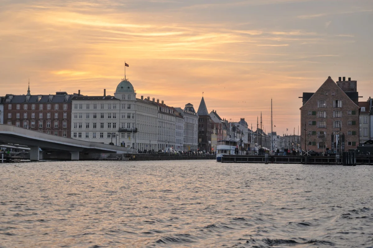 View of Copenhagen skyline at sunset with canal