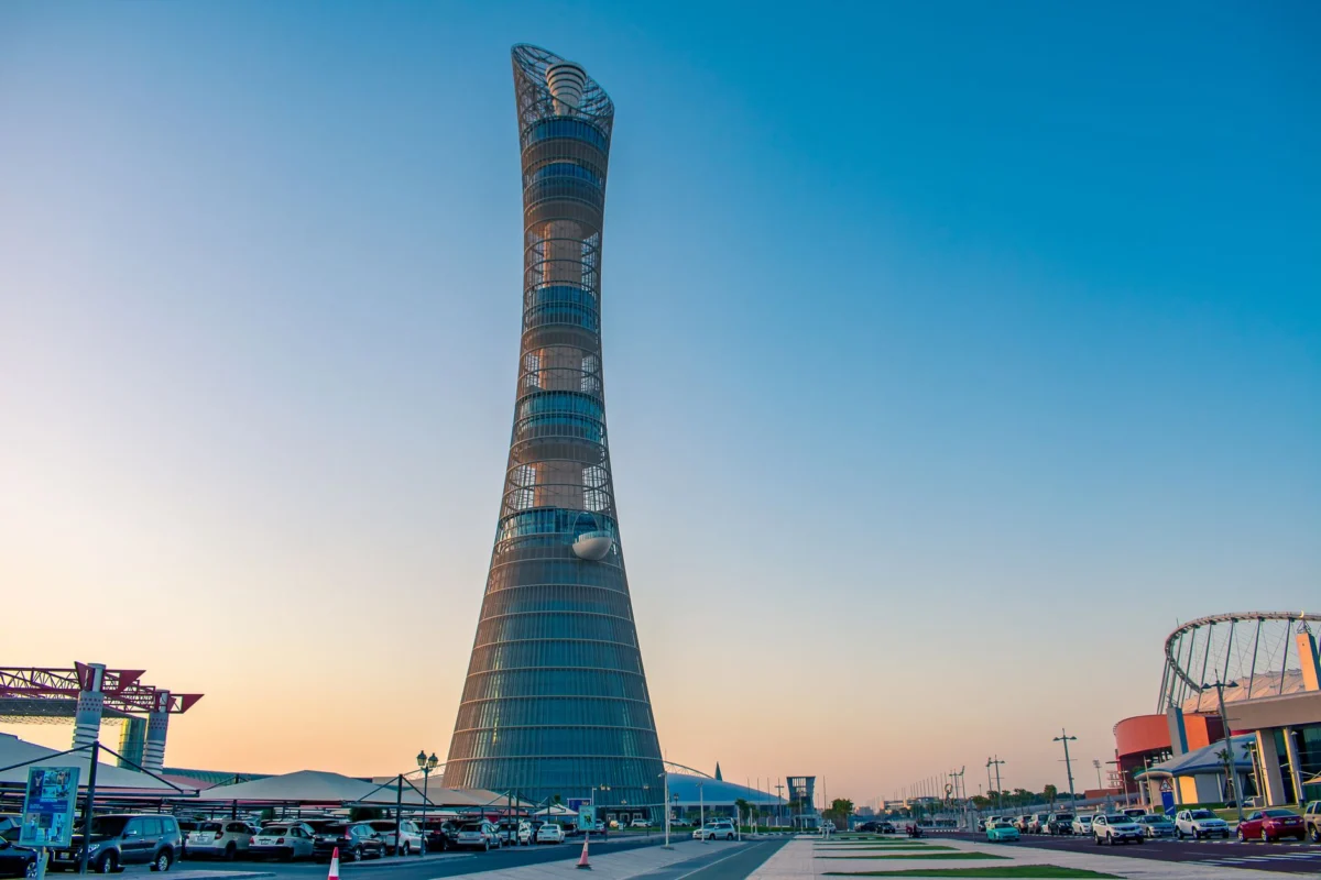 Panoramic view of Doha skyline at sunset with cultural landmarks