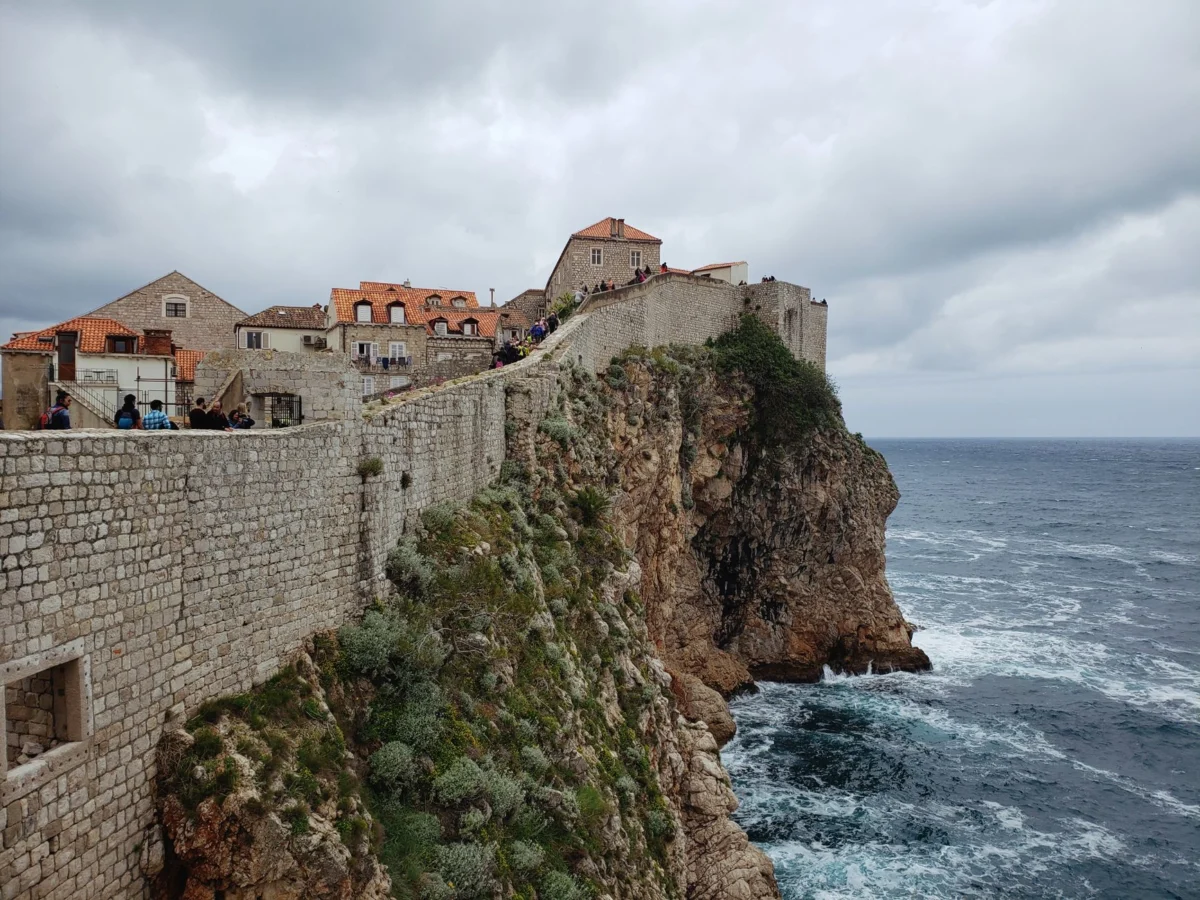 A compelling view of Dubrovnik's medieval walls against the Adriatic Sea