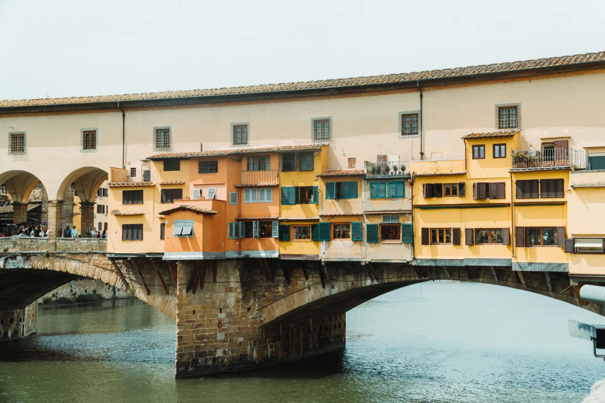 The iconic Ponte Vecchio bridge in Florence with clear skies