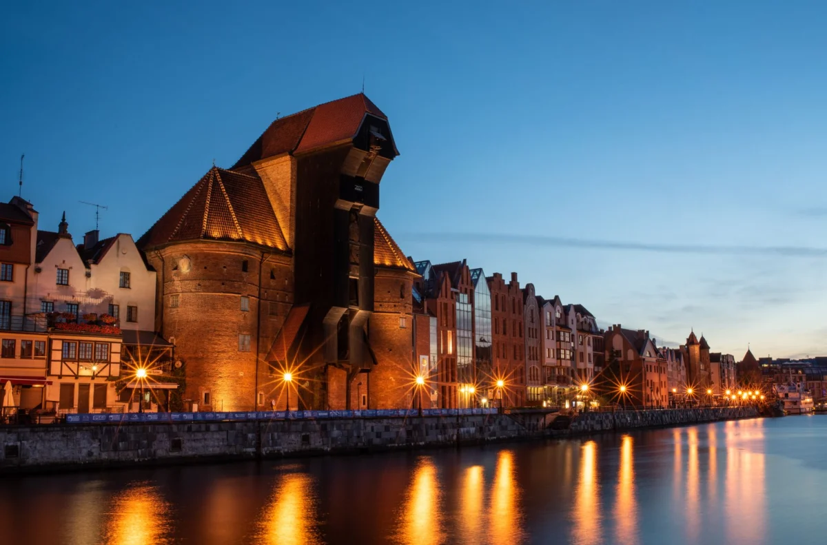 Scenic view of Gdansk riverside at night