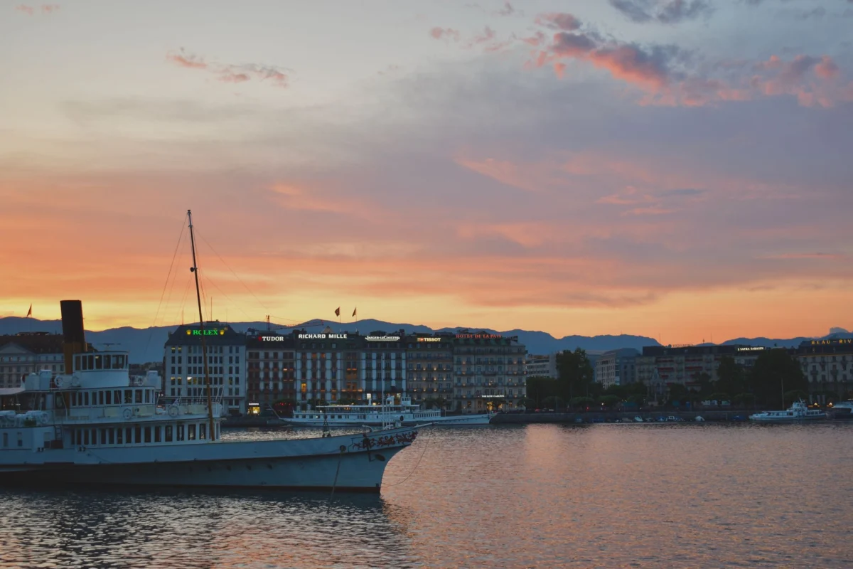 Scenic lakeside view in Geneva with mountains in the background