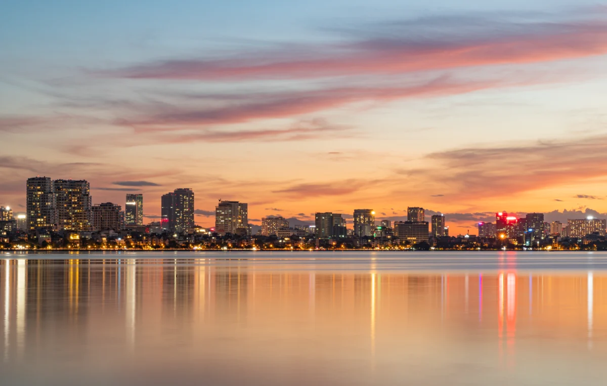 Scenic view of Hanoi skyline at sunset, featuring local architecture