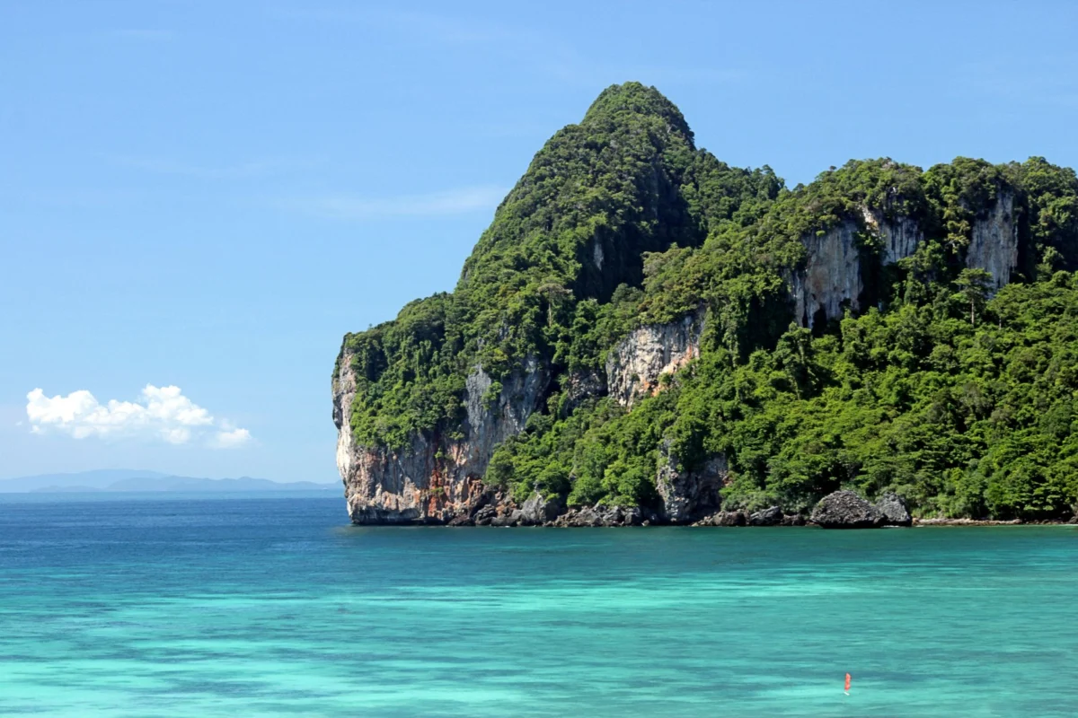 Towering limestone cliffs and lush greenery in Krabi