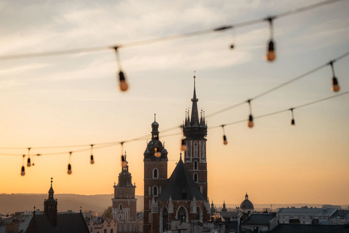 Romantic view of Krakow's old town skyline at sunset