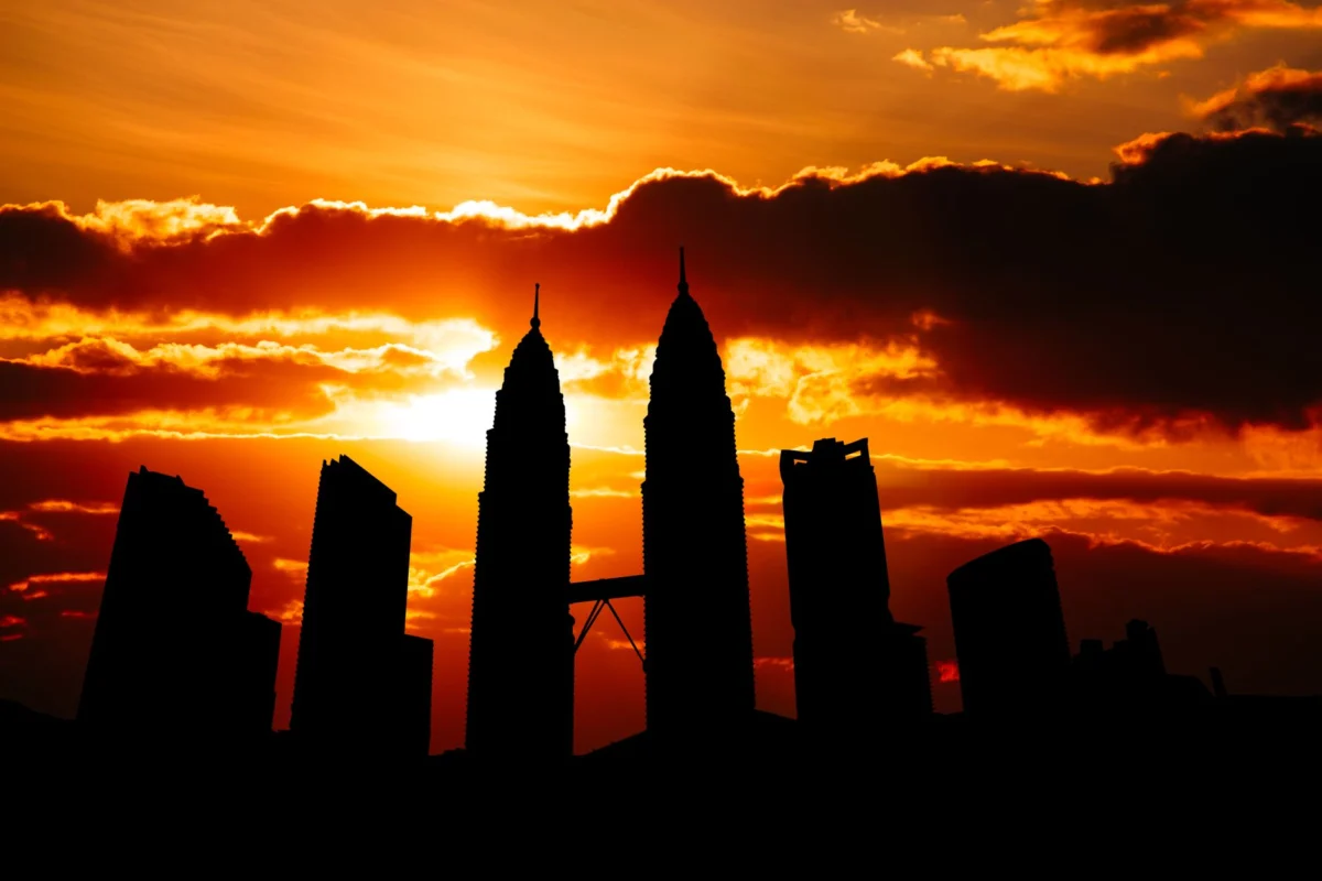 Scenic view of Kuala Lumpur skyline at dusk, highlighting the city's charm