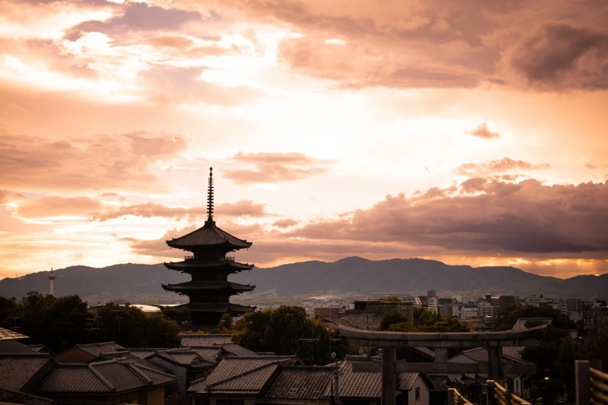 Kyoto skyline at sunset, featuring iconic landmarks