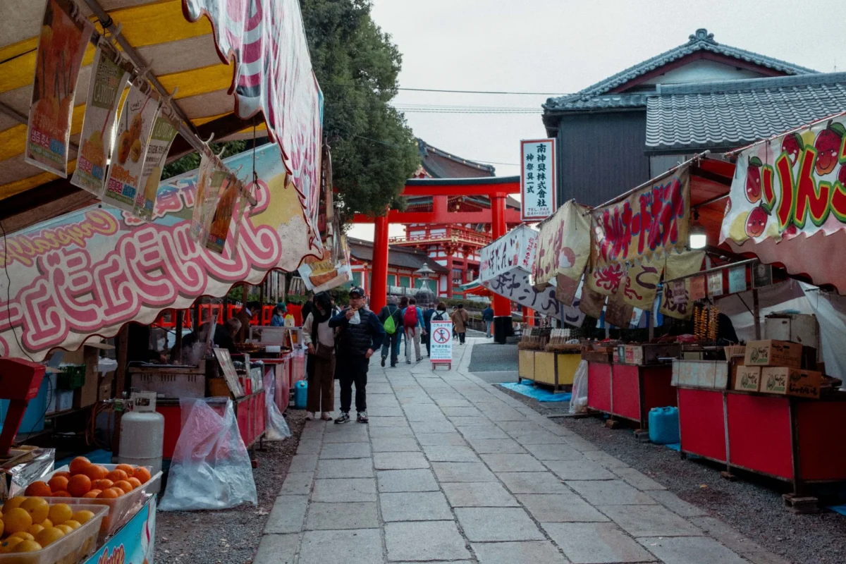 Bustling street market in Kyoto, showcasing local vendors and cultural ambiance