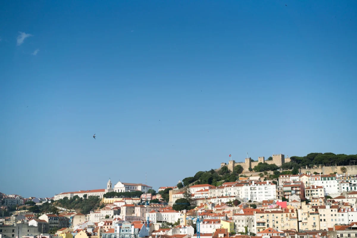 Panoramic view of Lisbon's historic skyline with iconic landmarks