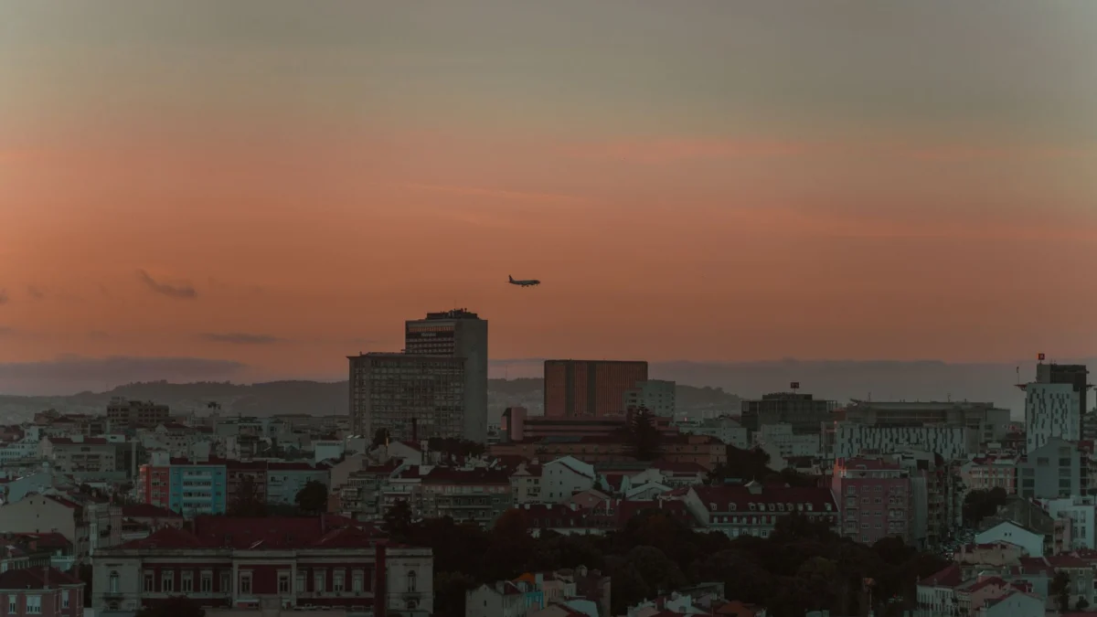 View of Lisbon skyline at sunset, highlighting romantic charm
