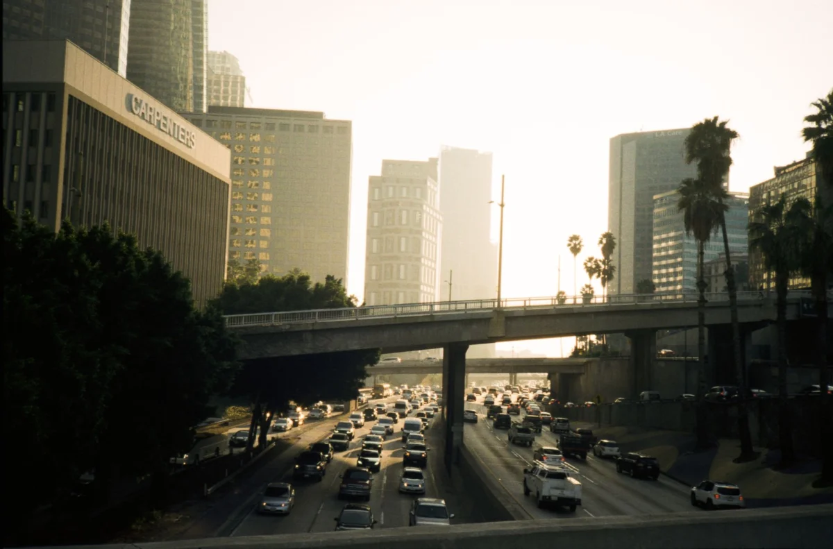 The iconic Los Angeles skyline with a sunset backdrop