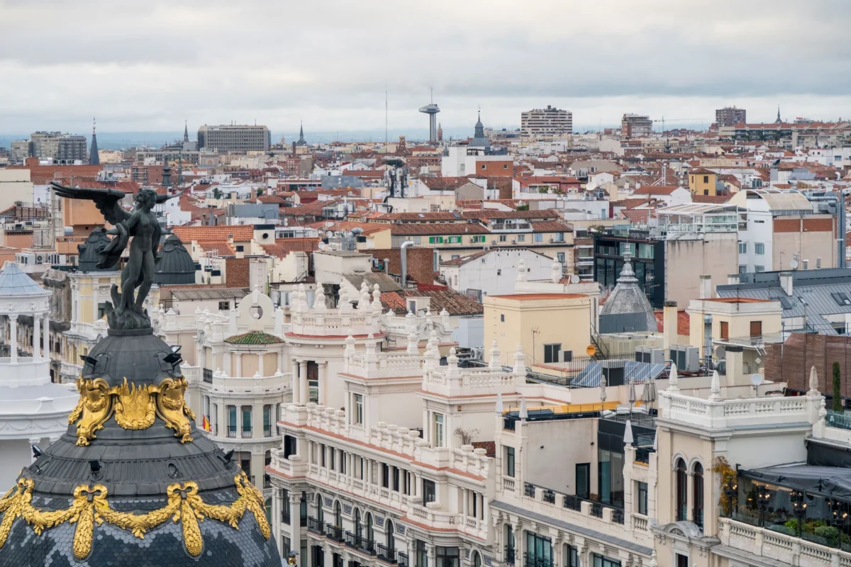 View of Madrid's skyline from a rooftop at sunset