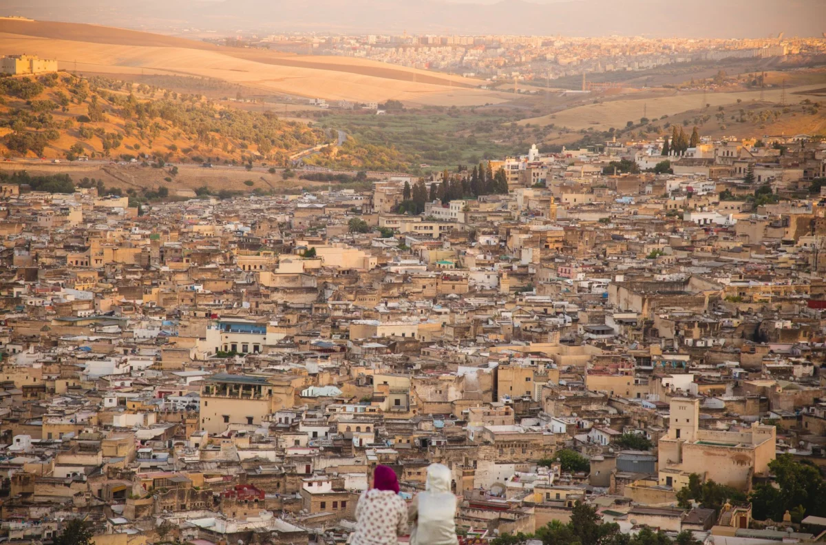 A stunning view of Marrakech from a rooftop at sunset