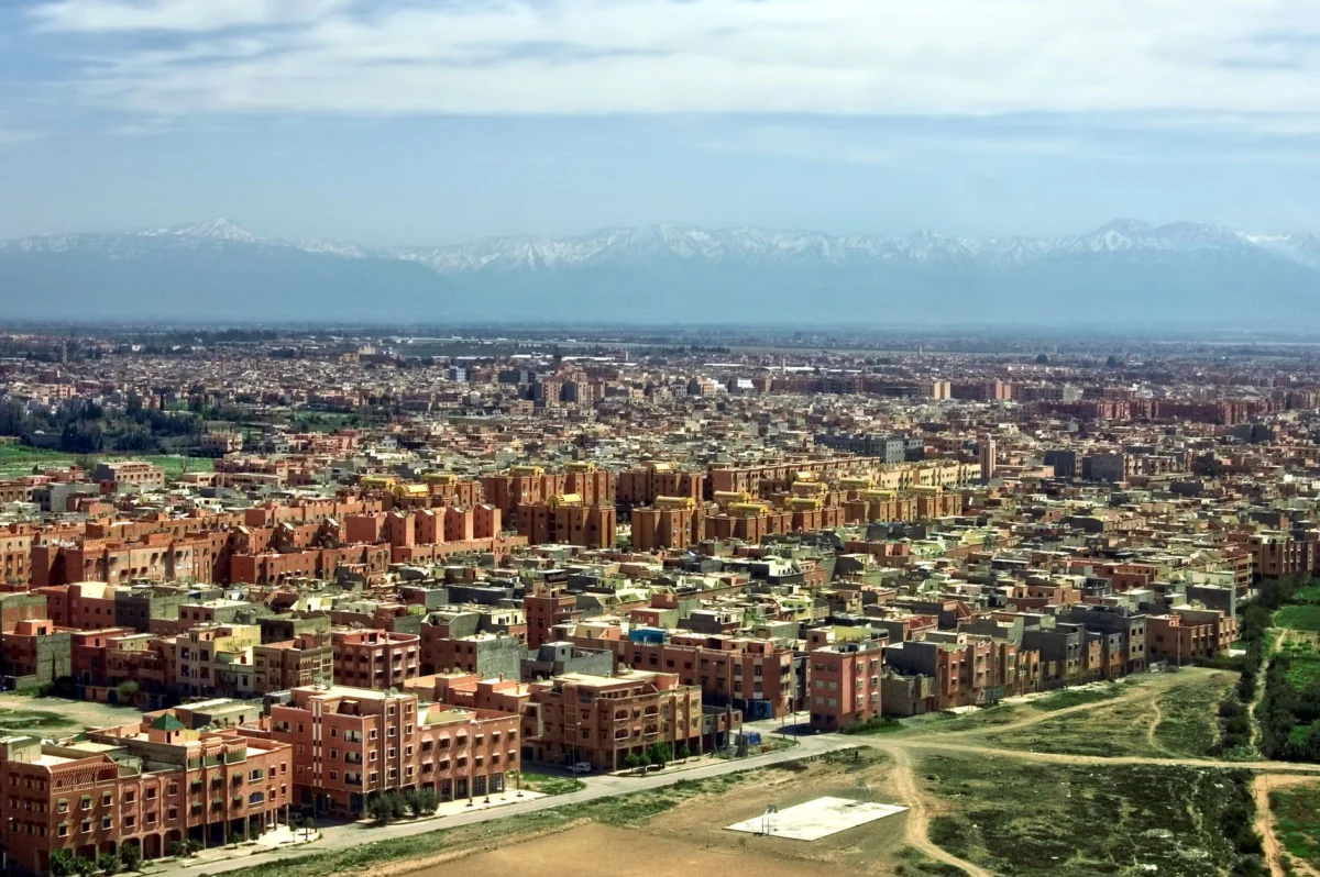 Sunset view over the Marrakech skyline featuring iconic architecture