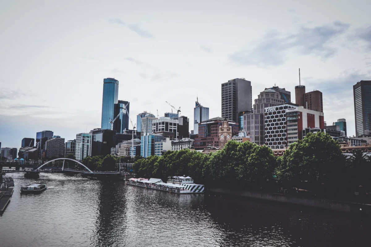 View of Melbourne skyline at dusk across the river