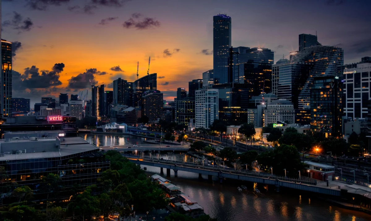 A stunning view of Melbourne's skyline at dusk reflecting in the Yarra River.