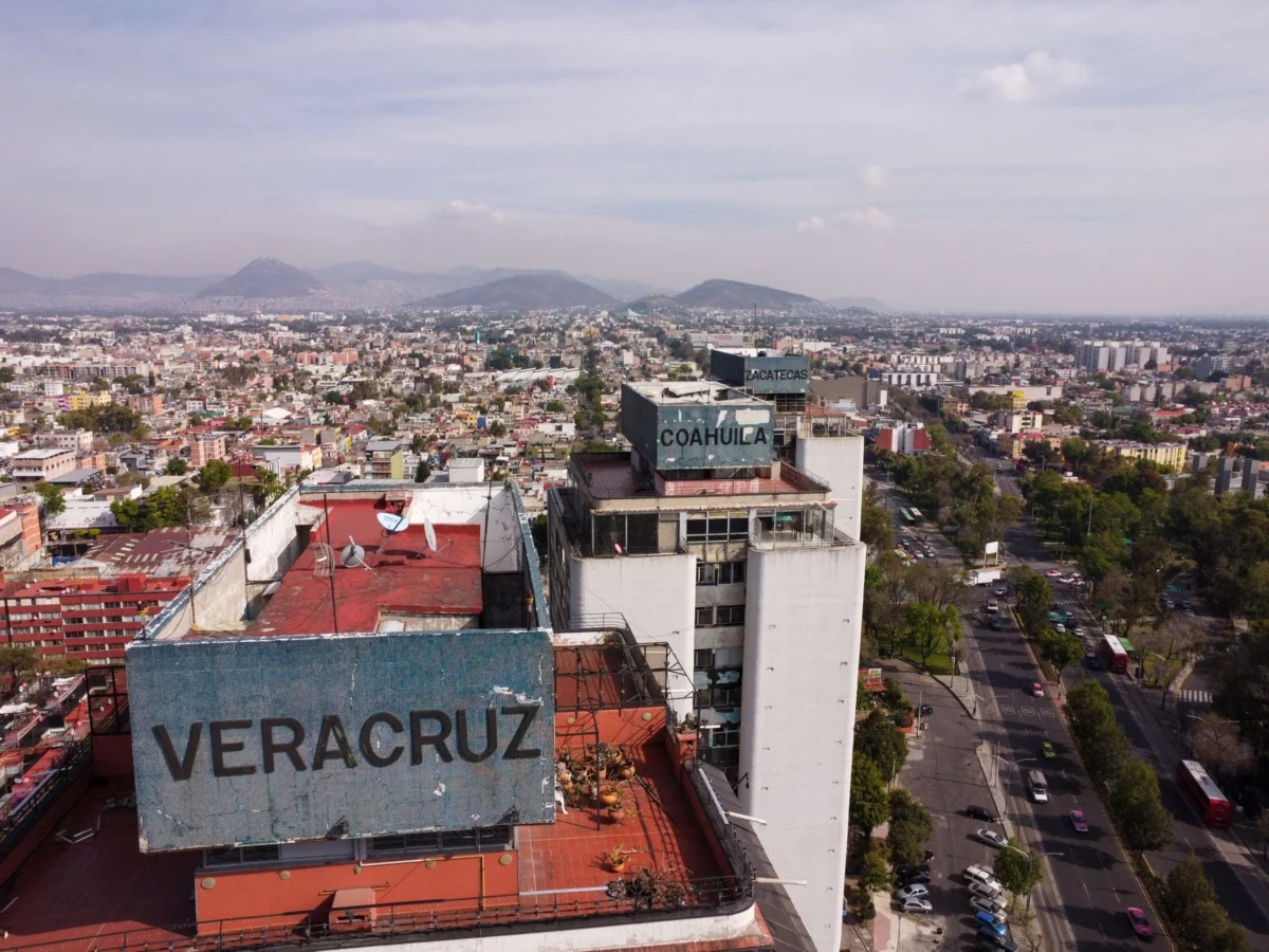 Romantic rooftop view of Mexico City at night