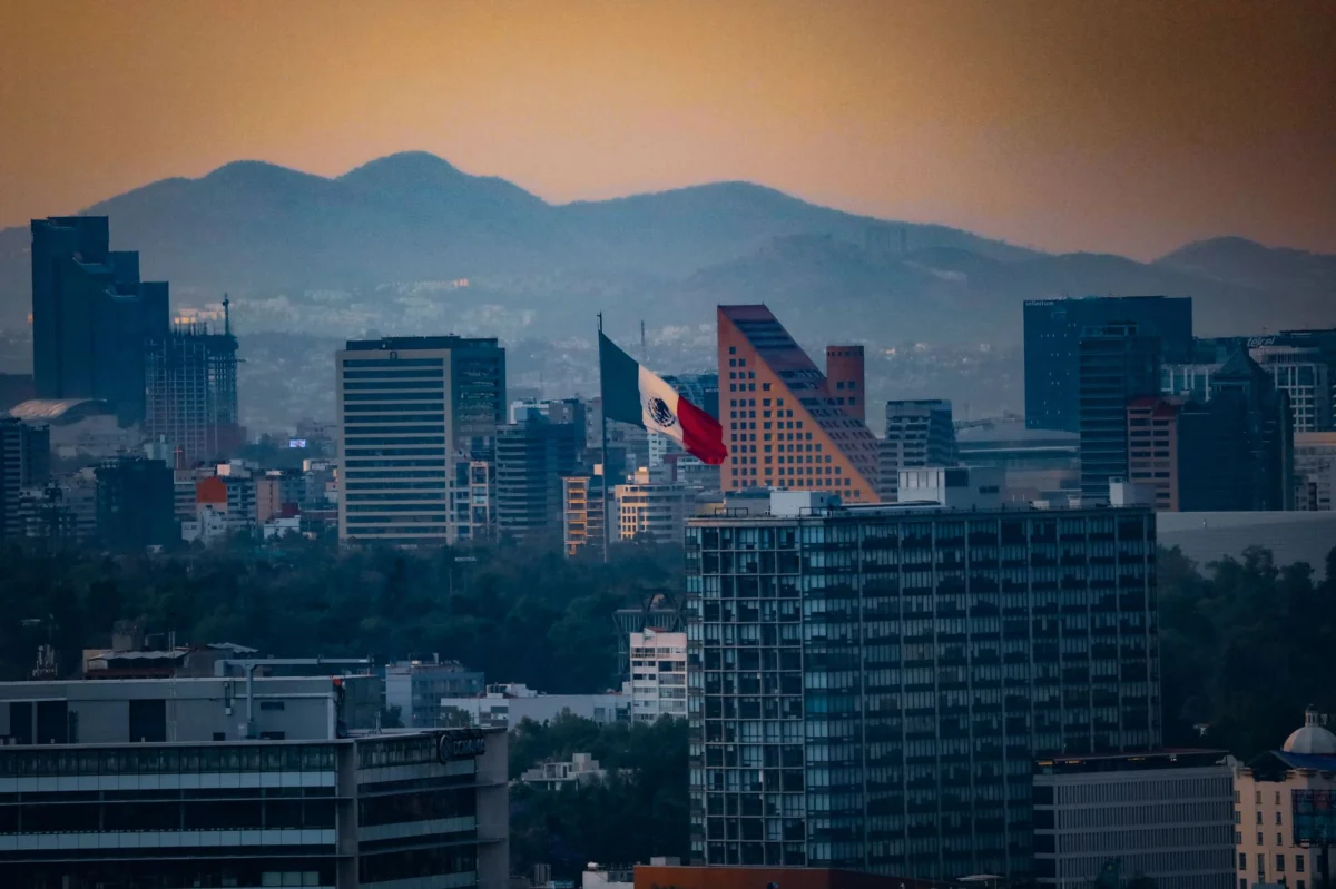 Panoramic view of Mexico City's skyline featuring iconic landmarks