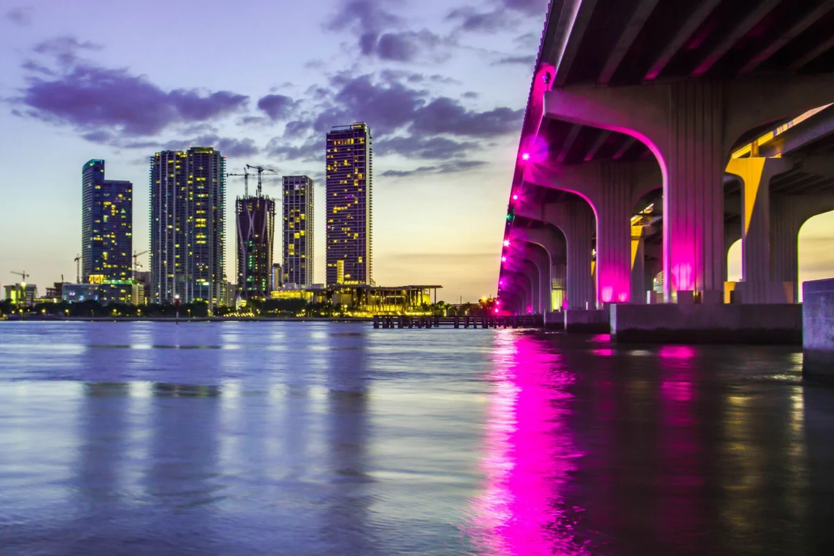 Breathtaking view of downtown Miami at sunset with city lights