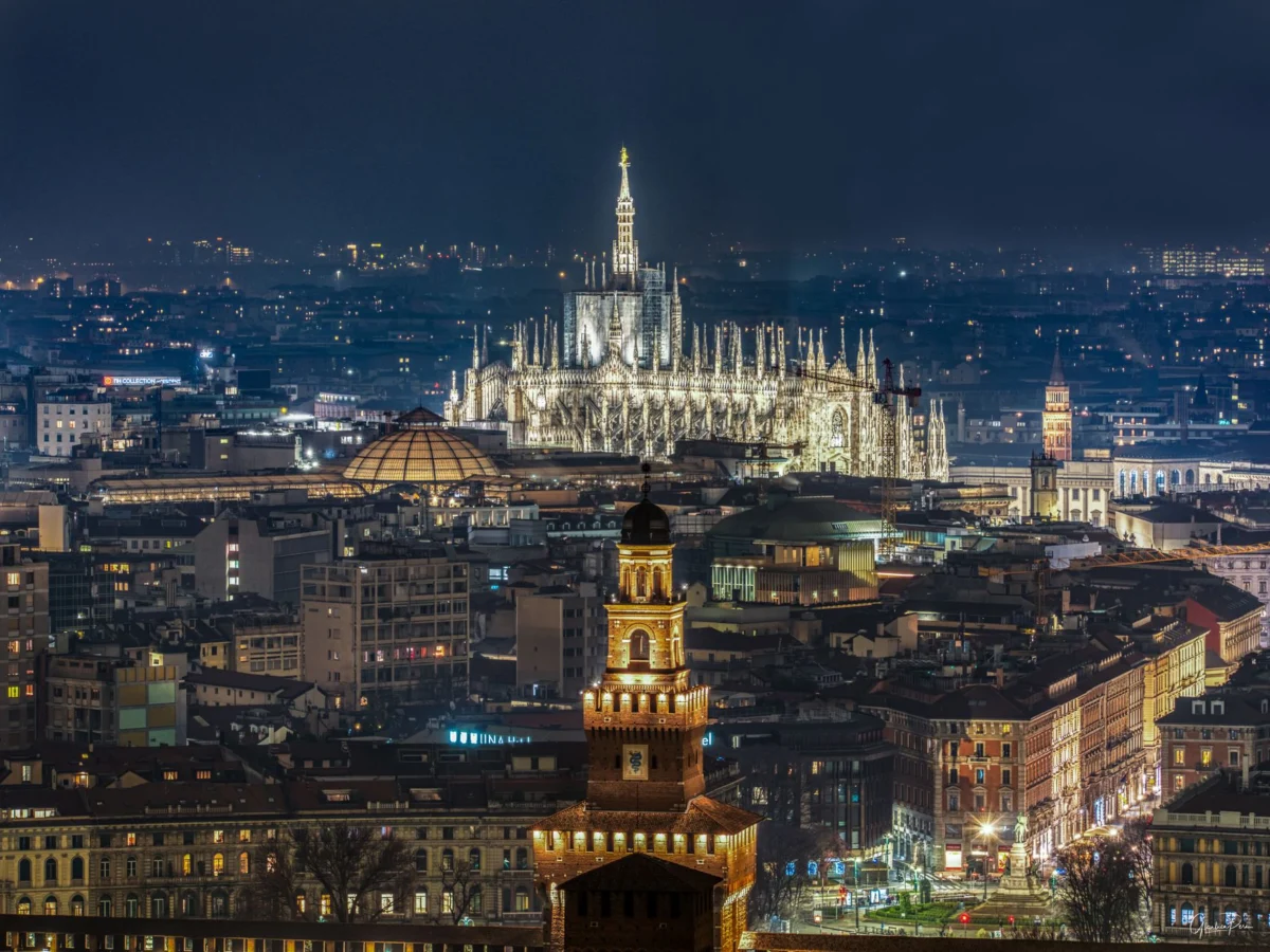 Twilight view of Milan's skyline showcasing iconic landmarks