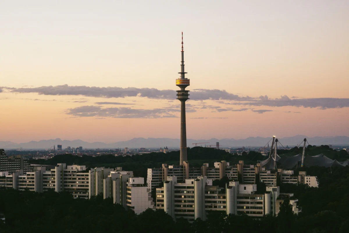Romantic Munich skyline at sunset with iconic landmarks