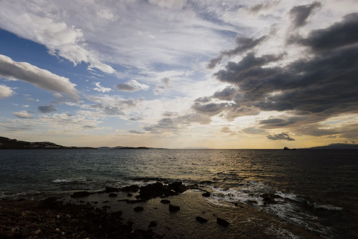Sunset over Mykonos coastline with romantic settings