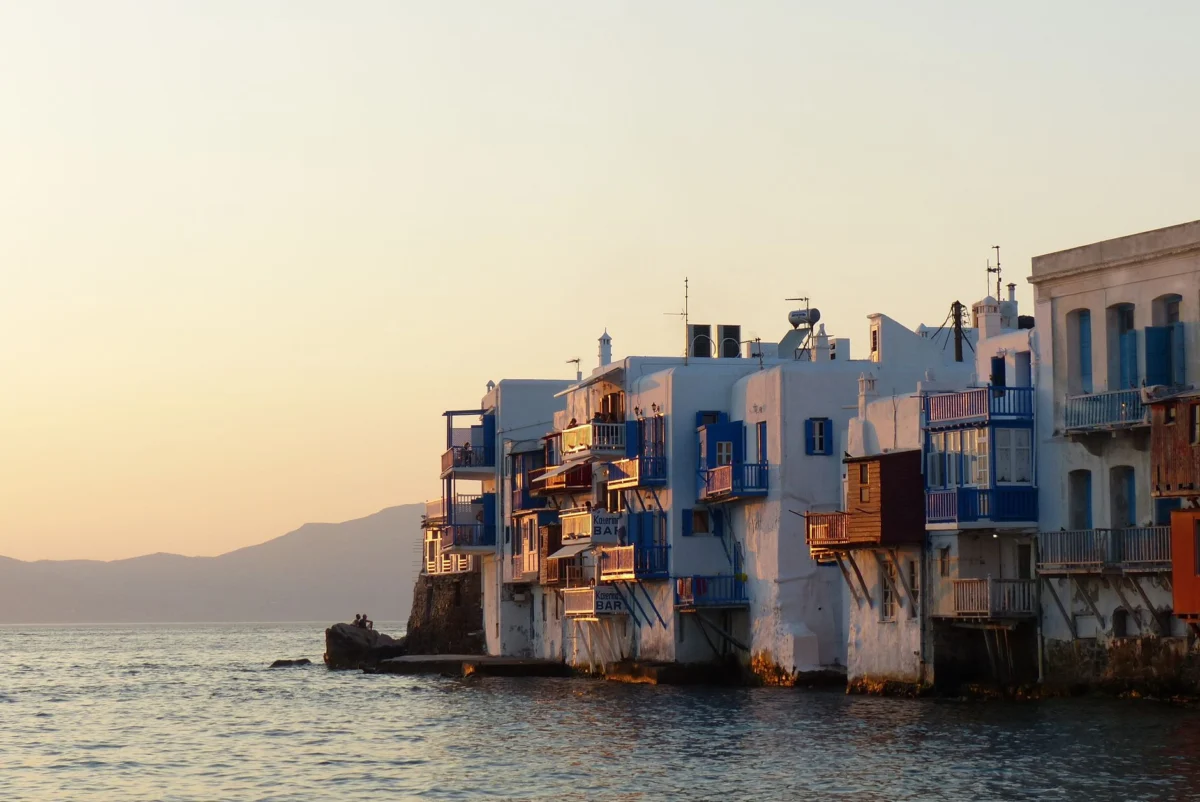 A romantic waterfront dining setting in Mykonos