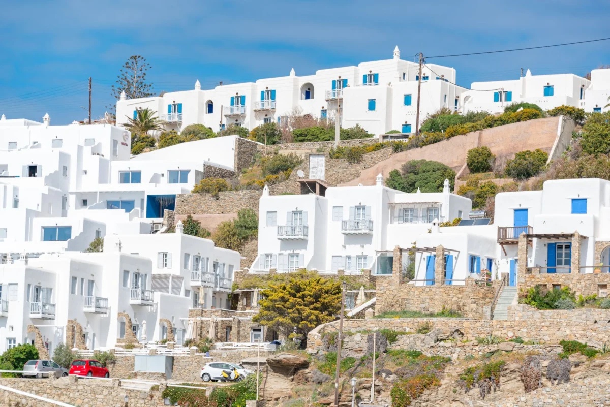 Iconic white buildings with blue domes in Mykonos