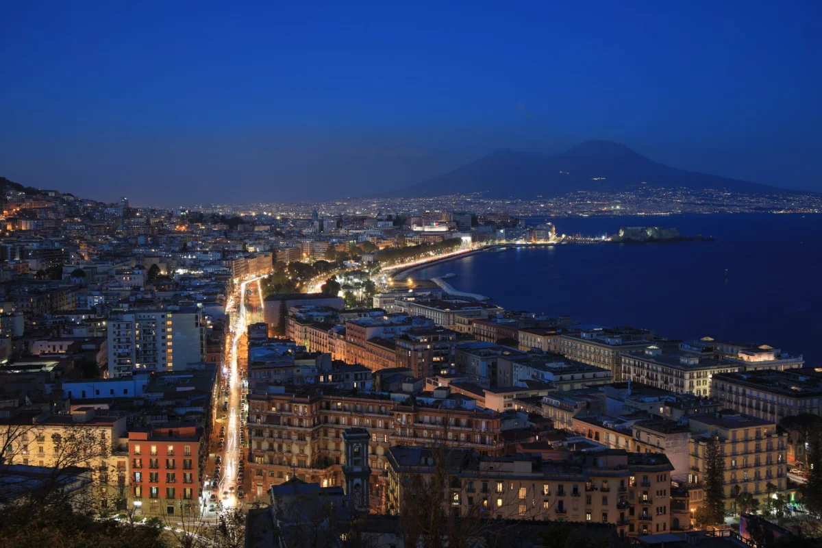 Evening view of Naples city skyline highlighting the romantic charm