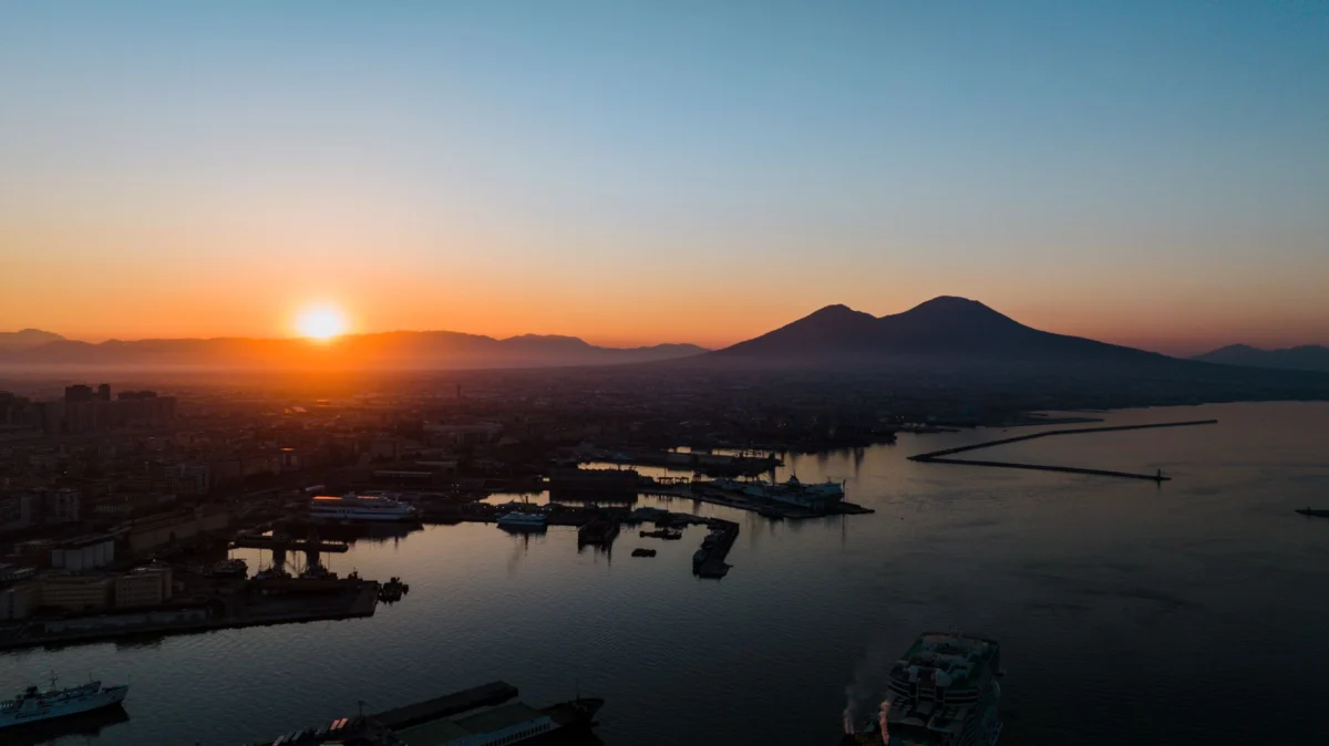 Romantic view of Naples skyline at sunset