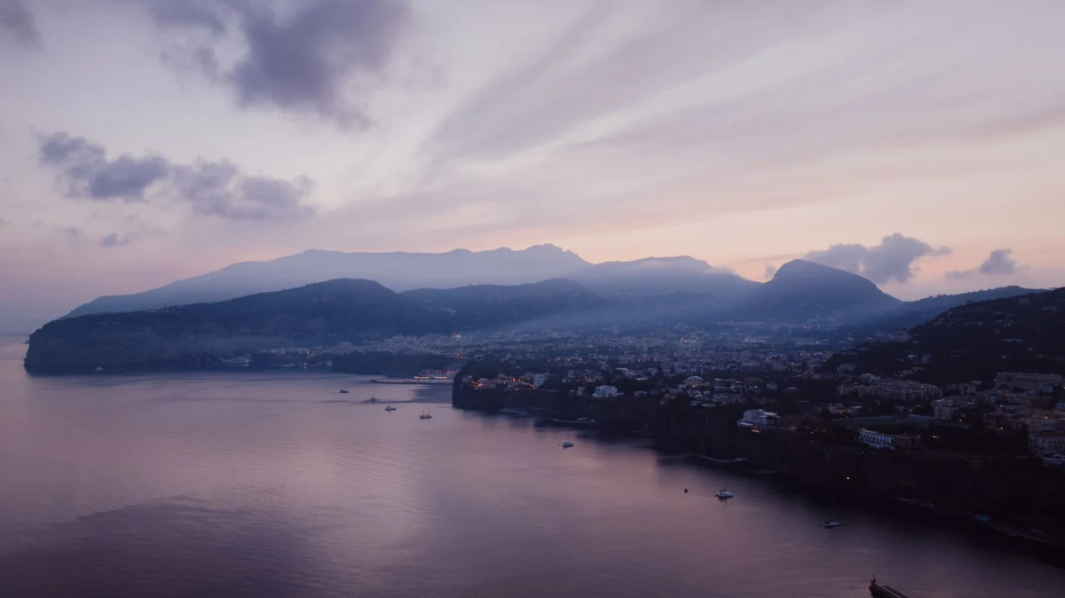 Romantic sunset view of Naples coastline for couples