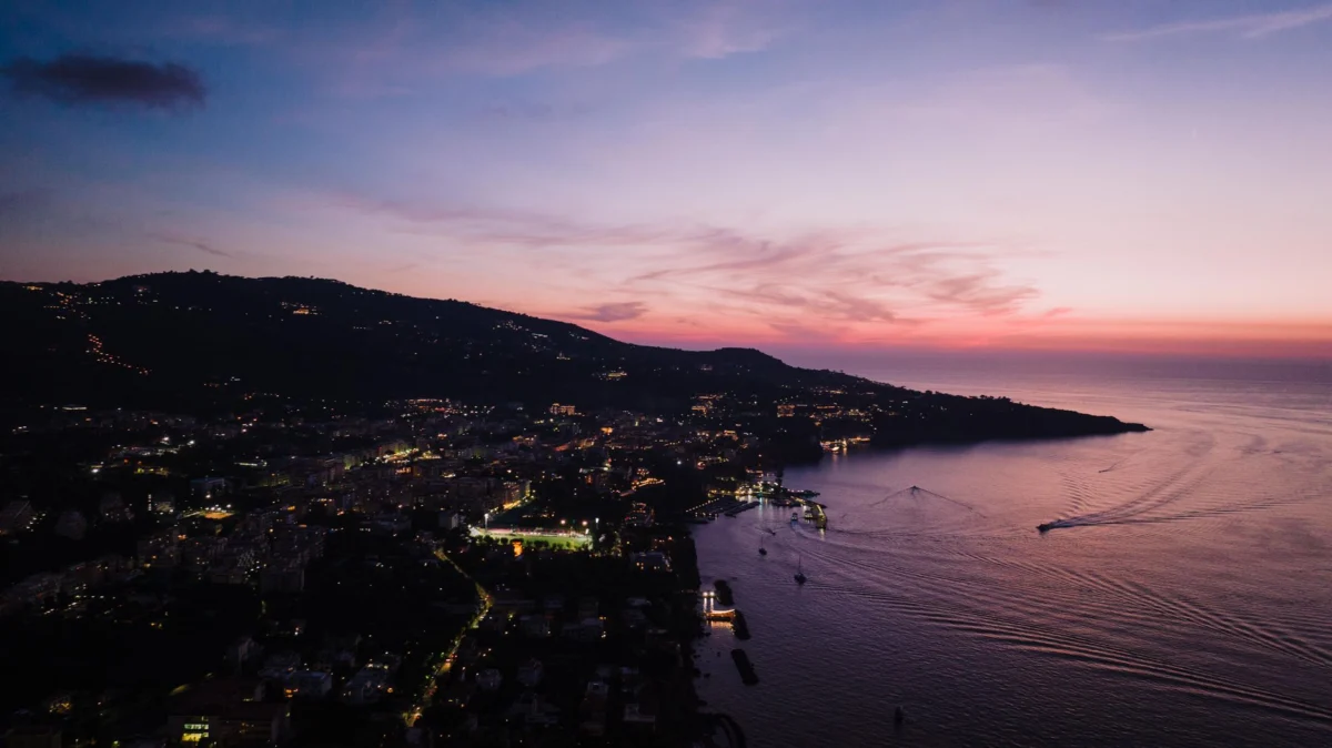 Stunning view of Naples skyline at sunset showcasing iconic landmarks