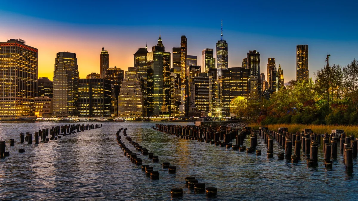 Romantic sunset over New York skyline with iconic landmarks